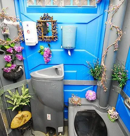 How to make a porta potty more classy for an outdoor wedding